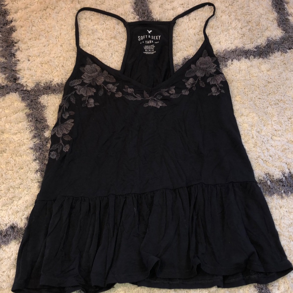 Tank top with floral pattern near neckline